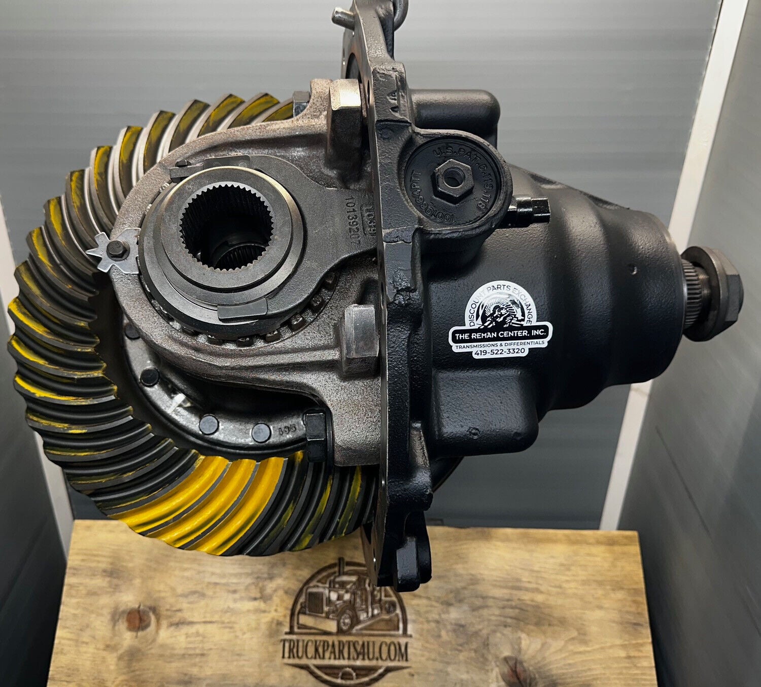 Side view of R172D557 Dana Spicer S23-172D differential head assembly 5.57 ratio new take-out by DPX showing carrier and ring gear